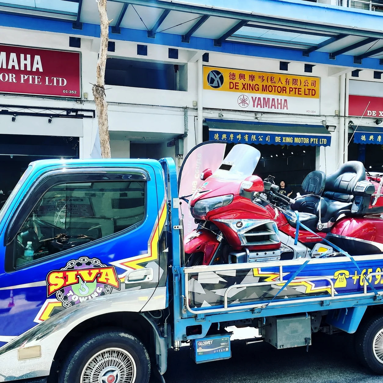 Motorcycles loaded on a Siva Towing lorry for planned inspection transport