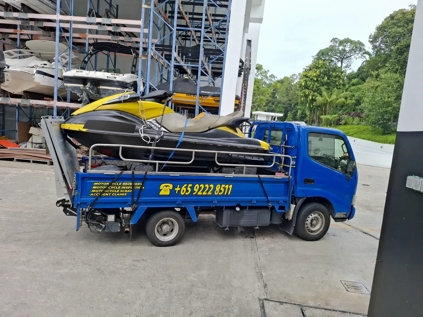 Siva Towing lorry transporting a motorcycle for an authorised handover
