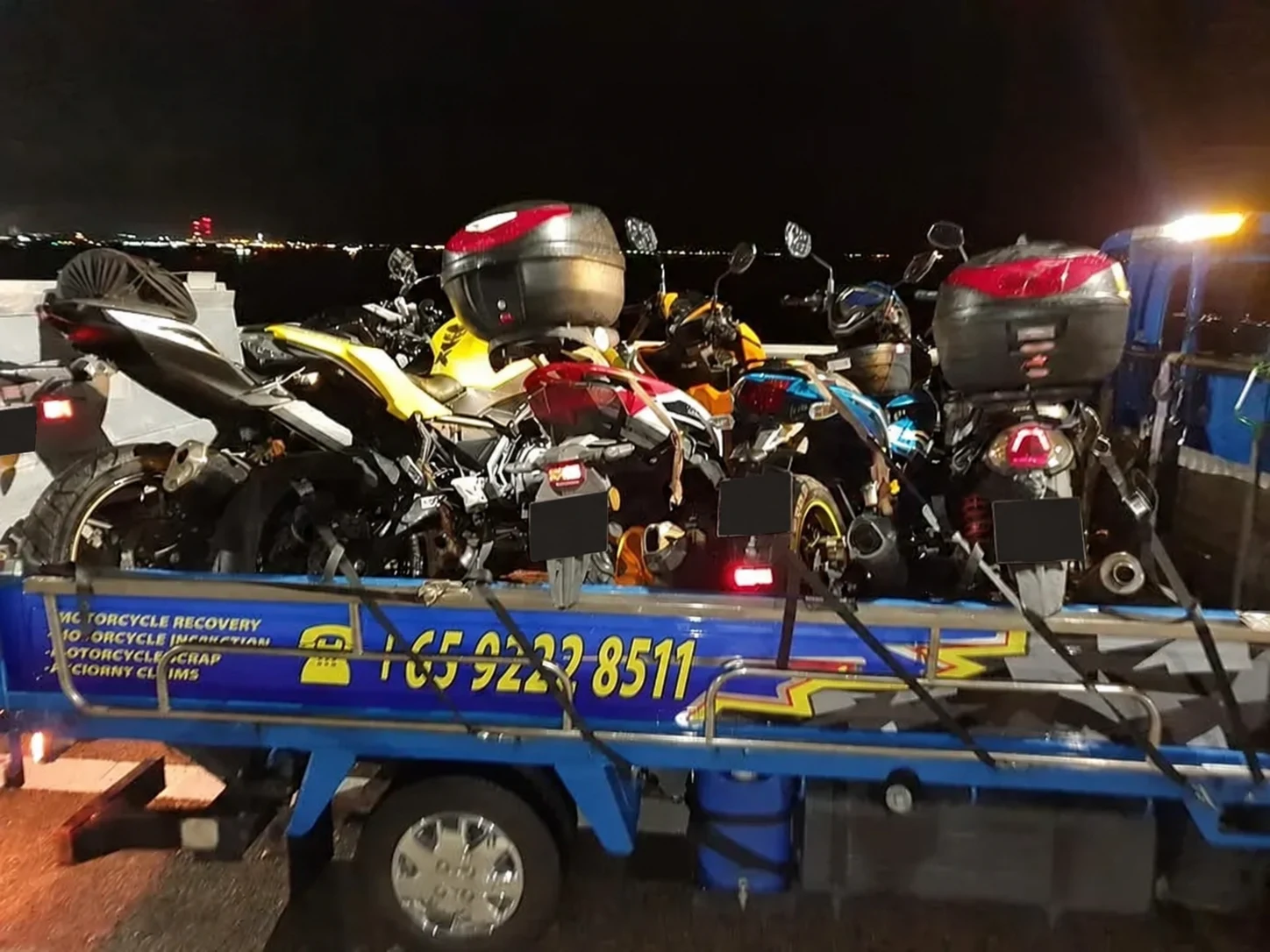 Multiple motorcycles secured for a coordinated night transport job