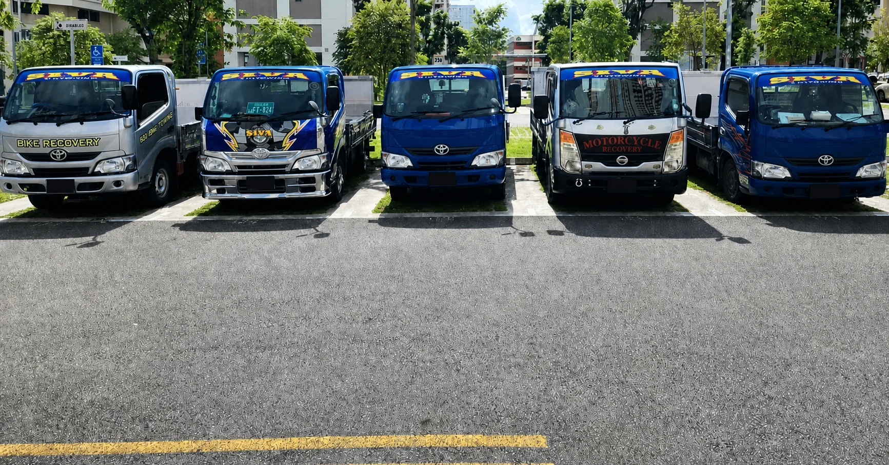 Siva Towing motorcycle recovery fleet assembled in Singapore