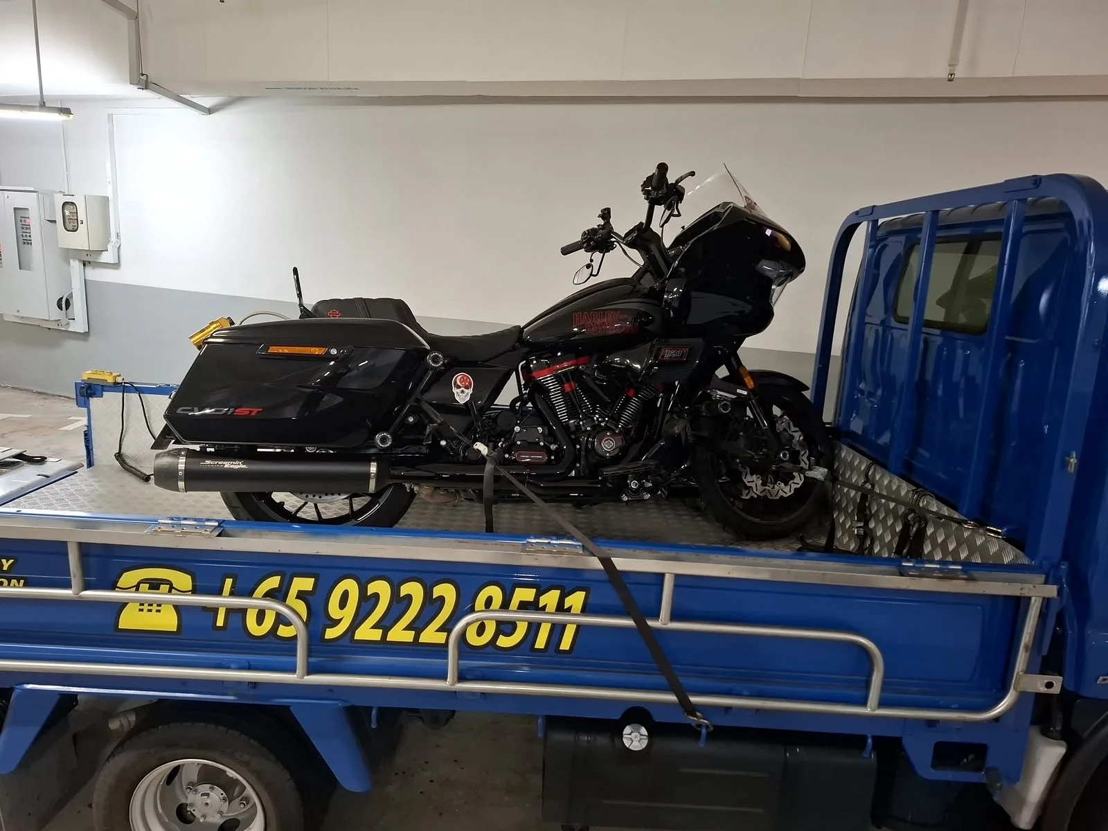 Touring motorcycle secured for transport on a Siva Towing lorry